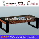 Long rattan coffee table with glass top