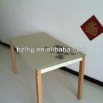 New style beige table with glass top and wooden legs(1550) 1550