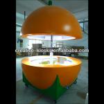 orange outdoor fiber glass juice kiosk