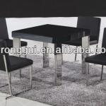 stainless legs black tempered glass dining table contemporary style 001